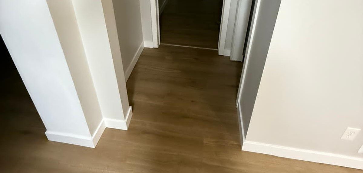 Interior hallway with freshly painted walls and baseboards